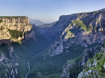 Early Morning Sun Starts To Light Up The Vikos Gorge And Voidomatis River, From The Beloi Viewpoint by Lizzie Shepherd Pricing Limited Edition Print image