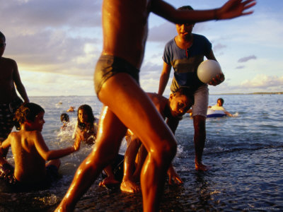 Children Playing On The Shore, Funafuti Atoll, Tuvalu by Peter Bennetts Pricing Limited Edition Print image