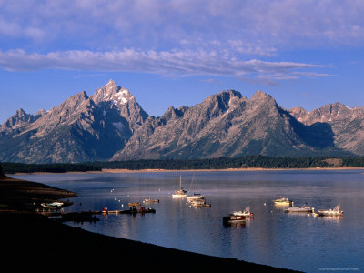 Boats On Jackson Lake And Distant Mountains by Alice Grulich-Jones Pricing Limited Edition Print image