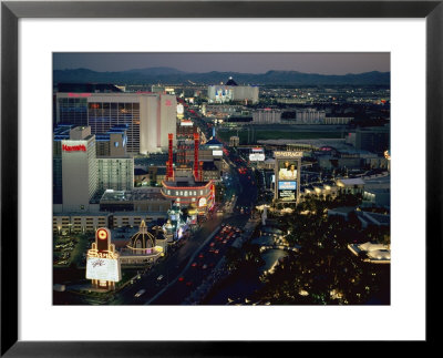 Aerial View Of The Strip In Downtown Las Vegas At Night by Maria Stenzel Pricing Limited Edition Print image