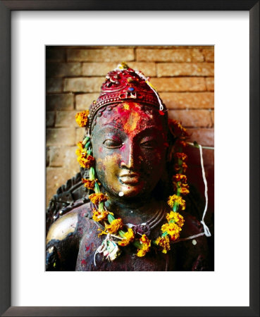 Deity With Garlands And Bindi Powder, Bhaktapur, Bagmati, Nepal by Anthony Plummer Pricing Limited Edition Print image