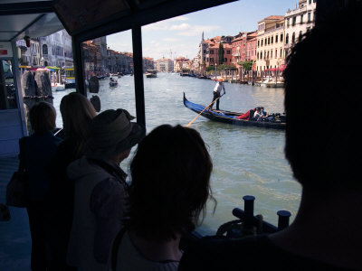 Visitors Wait At A Vaporetto Stop And Watch Gondoliers In Grand Canal, Venice, Italy by Robert Eighmie Pricing Limited Edition Print image