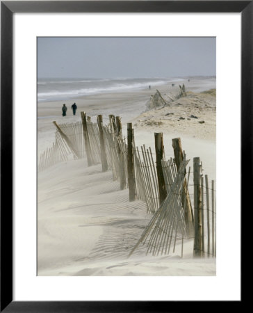 Snow Fence Stretches Across A Dune In An Attempt To Curb Erosion by Skip Brown Pricing Limited Edition Print image