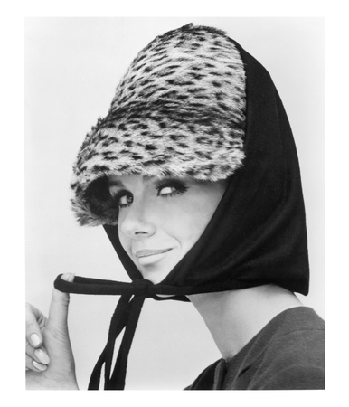 Nicole De La Marge In An Otto Lucas Jersey Scarf Over An Ocelot Hat, 1964 by John French Pricing Limited Edition Print image