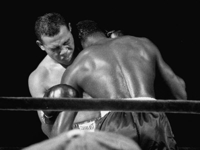 36-Year-Old Joe Louis Fighting Ezzard Charles At Yankee Stadium by Ralph Morse Pricing Limited Edition Print image