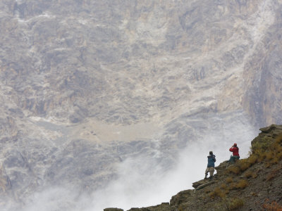 Researchers Scanning The Mountains For Snow Leopards by Steve Winter Pricing Limited Edition Print image