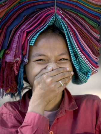 Little Girl Selling Clothes In Angkor Wat, Cambodia by Scott Stulberg Pricing Limited Edition Print image