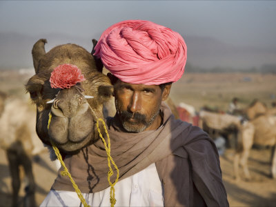 Indian Man With His Camel In The Desert by Scott Stulberg Pricing Limited Edition Print image