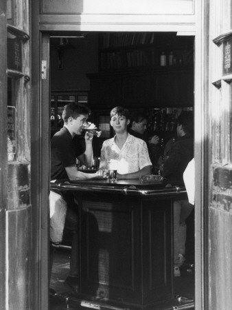A Couple Drinking In A Camden Pub, London by Shirley Baker Pricing Limited Edition Print image