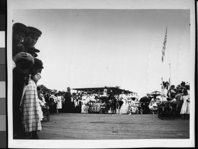 Children Dressed In Their Sunday Best, Lining Up To Be Photographed With Baby Carriages At Parade by Wallace G. Levison Pricing Limited Edition Print image