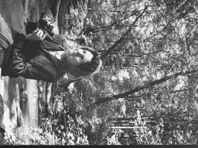 Biologist/Author Rachel Carson Holding Binoculars As She Sits In Wooded Park While Birdwatching by Alfred Eisenstaedt Pricing Limited Edition Print image