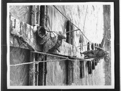 Two Us Ninth Army Infantrymen Under Intense Machine Gun And Mortar Fire During Wwii by George Silk Pricing Limited Edition Print image