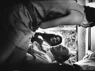 Ballet Master George Balanchine Talking With Dancers During Flight With Nycb Company by Gjon Mili Pricing Limited Edition Print image