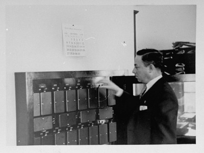 J.L. Koehl Shutting Off All Telephones In The Crop Reporting Wing by Thomas D. Mcavoy Pricing Limited Edition Print image