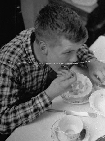 A Worker At A Ford Motor Company Plant Eating A Meal by William Vandivert Pricing Limited Edition Print image