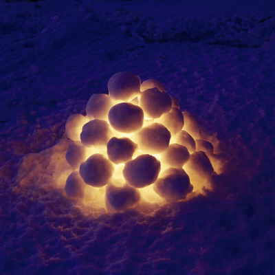 Close-Up Of Snowballs Lit Up At Night by Ove Eriksson Pricing Limited Edition Print image