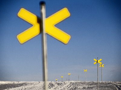 A Row Of Signs In Winter Landscape, Sweden by Bjorn Andren Pricing Limited Edition Print image