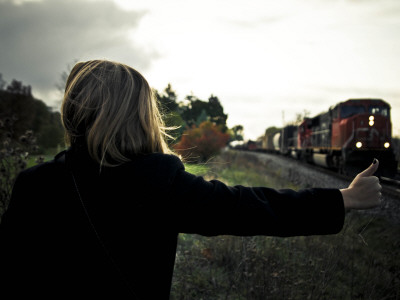 Woman Hitchhiking A Train by Brooke Pennington Pricing Limited Edition Print image