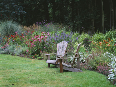 Sweeping Border Beside Wooden Adirondack Chairs With Echinacea, Nepeta And Grasses by Clive Nichols Pricing Limited Edition Print image
