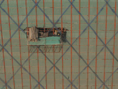 Construction Workers Prepare Wooden Planks For Craning, Large Building Project, Beijing by Ben Mcmillan Pricing Limited Edition Print image