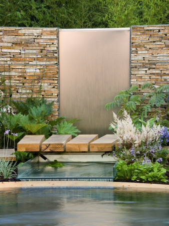 Hampton Court Flower Show 2006: Dry Stone Wall With Metal Water Feature With Fountain by Clive Nichols Pricing Limited Edition Print image