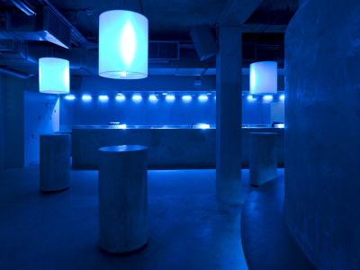 Matter, The O2, Peninsula Square, London, Drum Tables Of Concrete And Bar With Blue Lights by G Jackson Pricing Limited Edition Print image