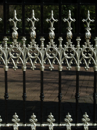 Backgrounds - Detail Of Elaborate White Finials On Black Metal Railings by Natalie Tepper Pricing Limited Edition Print image