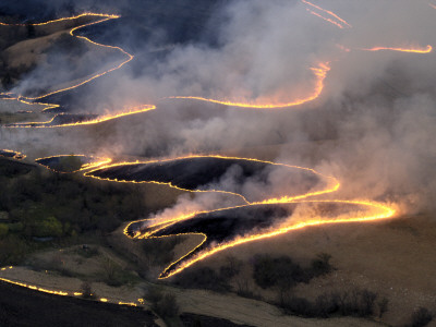 Carefully Managed Fires Sweep Across The Flint Hills In Spring by Jim Richardson Pricing Limited Edition Print image