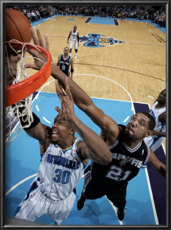 San Antonio Spurs V New Orleans Hornets: David West And Tim Duncan by Layne Murdoch Pricing Limited Edition Print image