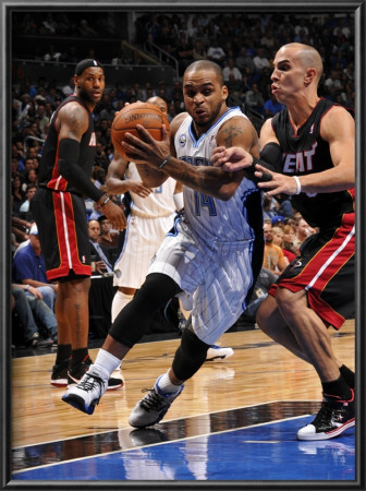 Miami Heat V Orlando Magic: Jameer Nelson And Carlos Arroyo by Fernando Medina Pricing Limited Edition Print image