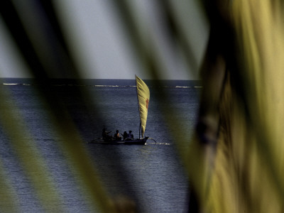 Faraway Sailboat, Indonesia by Michael Brown Pricing Limited Edition Print image