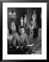 Senator John F. Kennedy Seated In Museum With Statues by Hank Walker Limited Edition Print