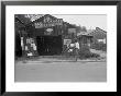 Advertisements For Popular Malaria Cure, Natchez, Mississippi, C.1935 by Ben Shahn Limited Edition Print