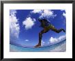 Man Jumping With Waters And Blue by Guy Crittenden Limited Edition Pricing Art Print