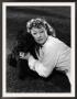 Greer Garson Posing With French Poodle, Coco, 1939 by Clarence Sinclair Bull Limited Edition Pricing Art Print