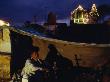 A Squatter Puffs A Water Pipe Under A Tarp In A City Cemetery by Reza Limited Edition Print