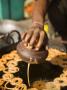 Man Frying Jalebis Batter To Make Sweets At Roadside Stall by Gavin Gough Limited Edition Print