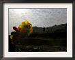 A Boy Walks As Selling Balloons In A Neighborhood In Kabul, Afghanistan, Thursday, August 24, 2006 by Rodrigo Abd Limited Edition Pricing Art Print