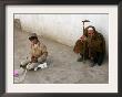 A Young Afghan Vendor Sells Toilet Paper At A Mosque by Rodrigo Abd Limited Edition Print