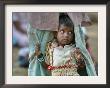 A Displaced Tamil Child Hangs To Her Father's Sarong by Gemunu Amarasinghe Limited Edition Pricing Art Print