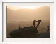 Children Play On Top Of A Destroyed Tank by Rodrigo Abd Limited Edition Print