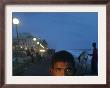 A Sri Lankan Boy Looks As He Sells Prawns At The Sea Front, In Colombo, Sri Lanka, June 30, 2006 by Manish Swarup Limited Edition Pricing Art Print