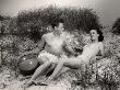 Couple Relaxing On Dunes At Beach by George Marks Limited Edition Print