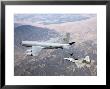 F-22 Raptor Receives Fuel From A Kc-135 Stratotanker by Stocktrek Images Limited Edition Print