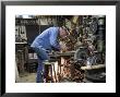Man Works In His Shop On A Family Farm In Nebraska by Joel Sartore Limited Edition Print