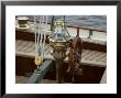 Ship's Wheel And Compass At The Helm Of A Wooden Sailboat, Mystic, Connecticut by Todd Gipstein Limited Edition Print