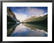 View At Sunrise Of Mountains Reflected On The Surface Of Lake Louise by Rich Reid Limited Edition Pricing Art Print