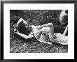 Young Couple Relaxing During Woodstock Music Festival by Bill Eppridge Limited Edition Pricing Art Print