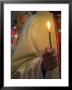 A Priest's Hand Holding A Candle During Mass In Easter Week, Old City, Israel by Eitan Simanor Limited Edition Print