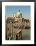 Gondolas Near The Grand Canal And The Santa Maria Della Salute, Venice, Italy by Janis Miglavs Limited Edition Print